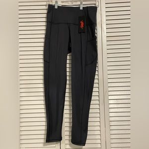 Charcoals grey, size medium, the gym people leggings.